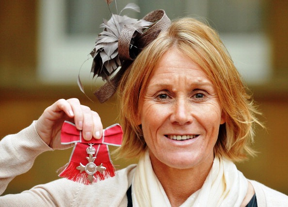 BPA director of sport and Chef de Mission to the ParalympicsGB at Sochi 2014 Penny Briscoe shows off her MBE at Buckingham Palace © Getty Images 