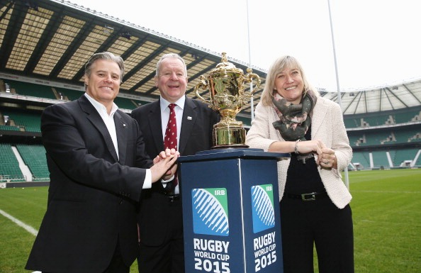 IRB chief executive Brett Gosper, RFU chairman Bill Beaumont and England 2015 chief executive Debbie Jevans pose with the Webb Ellis Cuo at today's ticketing announcement © Getty Images 