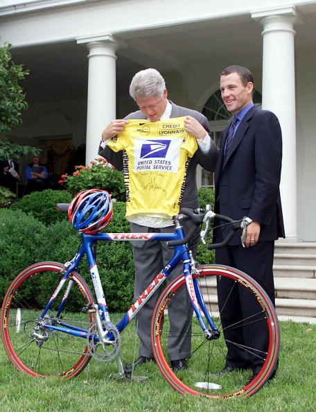 Lance Armstrong was fêted by United States President Bill Clinton at The White House following his victory in the 1999 Tour de France, his first of his seven consecutive wins in the world's most famous cycle race @Getty Images