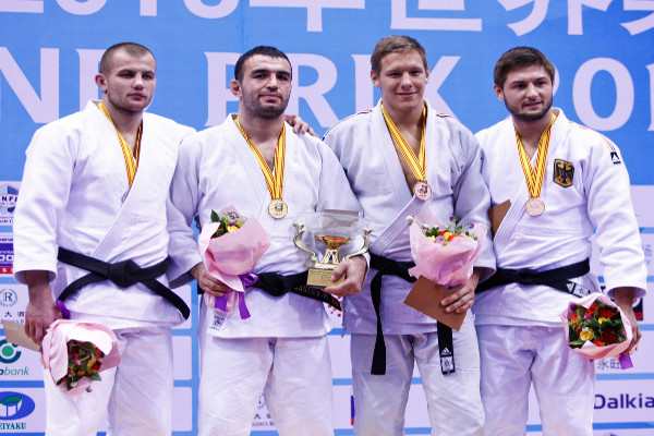 Murat Gasiev stands on top of a Judo Grand Prix podium for the first time after Russian and German judoka swept the under 90kg medal positions