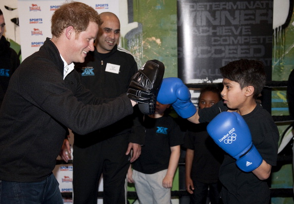 Prince Harry shares a ring with English youngsters in Nottingham...funding for clubs like these could be threatened ©Getty Images