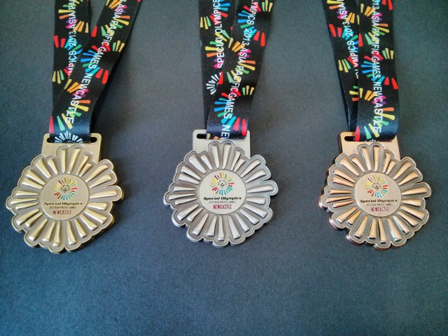 The medal set and ribbons that will adorn athletes at the Special Olympics 2013 Asia Pacific Games ©SOAPG2013