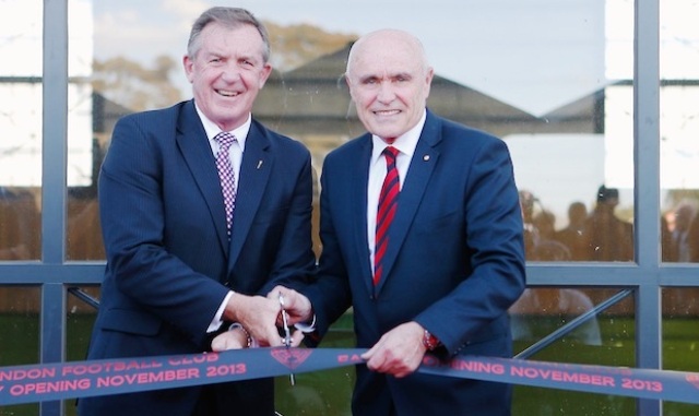 Victorian Minister for Sport and Recreation Hugh Delahunty (left) and Essendon Football Club chairman Paul Little cut the ribbon to officially open the True Value Solar Centre ©Essendon Football Club