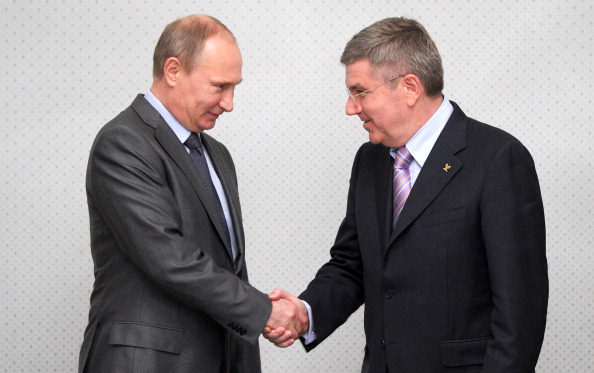 Vladimir Putin has promised Thomas Bach that athletes and officials at Sochi 2014 will be welcome regardless of their race or sexual orientation