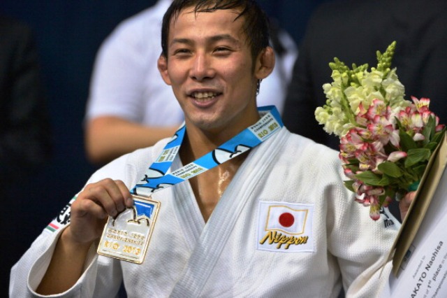 World champion Naohisa Takato will be hoping to be still smiling after the Grand Slam in Tokyo © AFP / Getty Images
