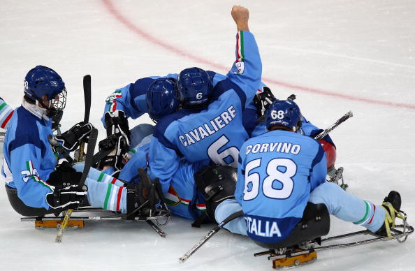 Italy's win over Sweden secured their qualification to Sochi 2014 with one game still remaining in Turin