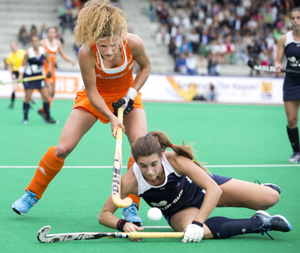 Maria Verschoor (pictured in orange) has won the FIH Talent of the Year award for 2013 ©AFP/Getty Images