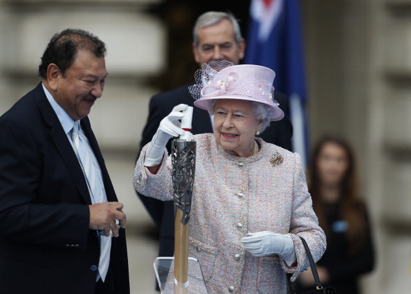 Prince Tunku Imran with Queen Elizabeth at the lighting Ceremony for the Queens Baton Relay earlier this year...he faces a battle to save his IOC membership ©Getty Images
