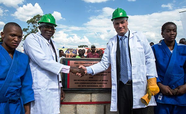 Zambian Deputy Minisiter for Youth and Sport Christopher Mulenga (left) and IJF media and communications director Nicolas Messner lay the first stone of the new national judo training centre in Lusaka ©IJF
