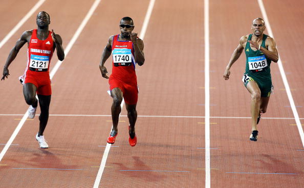 Stephan Buckland (centre), who features in the pilot Footprint film, takes silver in the 200m at the 2006 Commonwealth Games in Melbourne ©Getty Images