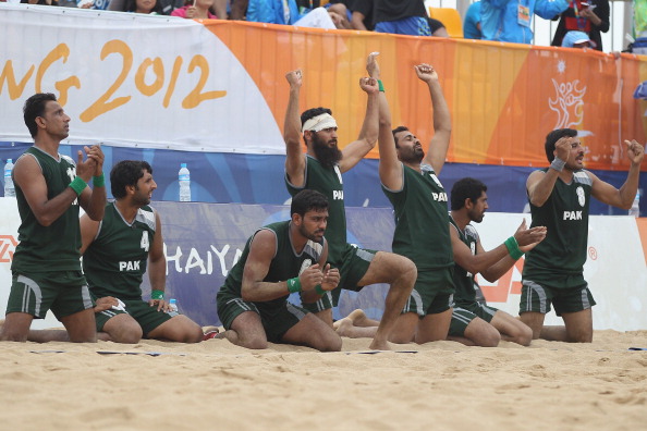 Pakistan celebrate after winning a handball bronze medal at the 2012 Beach Games in Haiyang ©Getty Images