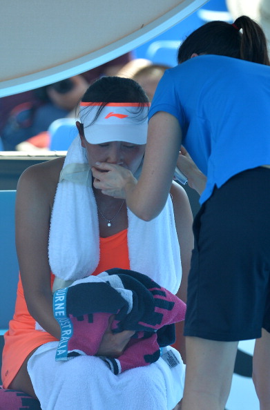 Peng Shuai said the heat caused her to cramp and vomit, and had to be helped from court after losing to Kurumi Nara ©Getty Images
