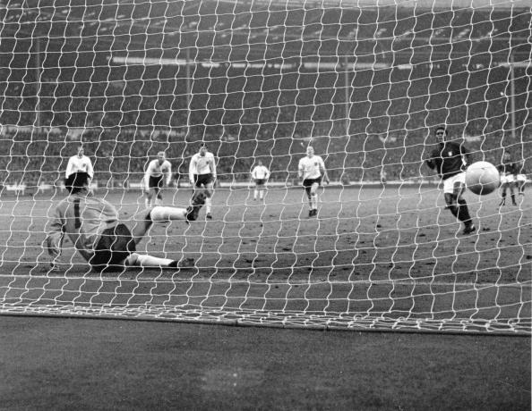 Eusébio on target against eventual winners England in the semi-final of the 1966 World Cup...he was the tournaments leading goal scorer ©Hulton Archive/Getty Images