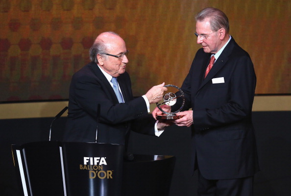 Jacques Rogge received the FIFA Presidential Award from Sepp Blatter ©Bongarts/Getty Images