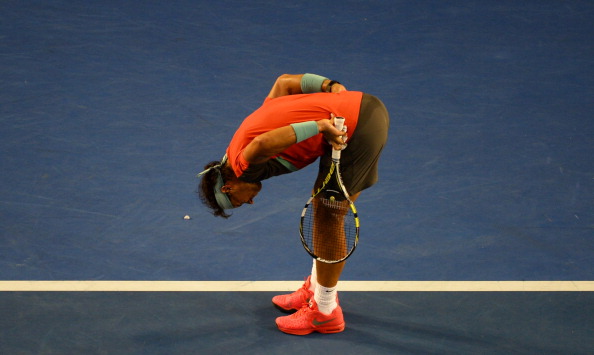 Rafael Nadal stretches his back during the final of the Australian Open ©AFP/Getty Images