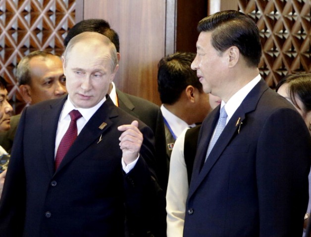 Russian President Vladimir Putin will welcome the support of Xi Jinping at Sochi 2014 ©AFP/Getty Images