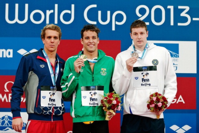 Chad le Clos (centre) finished the 2013 FINA World Cup series as the top men's swimmer ©Getty Images