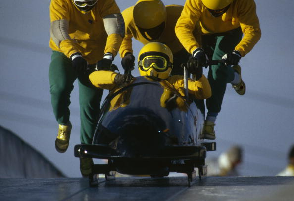 The real Jamaican bobsleigh team compete at their first Winter Olympics at Calgary in 1988 ©Getty Images