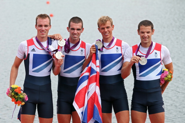 Rob Williams (second right) celebrates the silver medal he took on home waters at London 2012 ©Getty Images