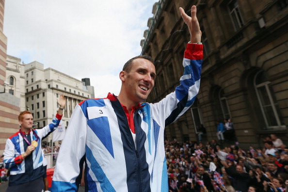 British middle distance runner Andy Baddeley, pictured during the Victory Parade after the London 2012 Games, holds the record for parkrun 5k events ©Getty Images