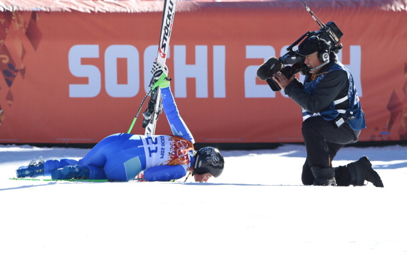 A photographer is determined not to miss out on Tina Maze's celebrations after jointly taking the lead ©AFP/Getty Images