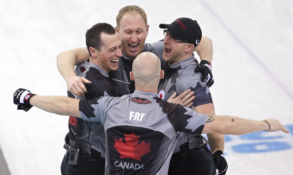Canada celebrate beating Great Britain to win the curling gold medal ©Toronto Star/Getty Images
