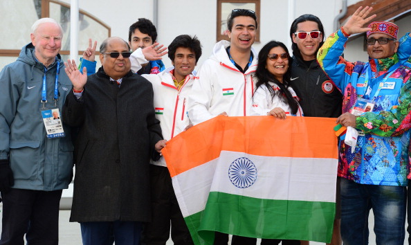 Indian athletes celebrate being able to display their flag following the IOC lifting its ban on the IOA ©AFP/Getty Images