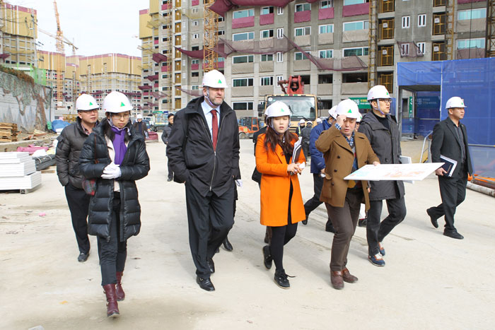 FISU delegates look around the construction site of the Athletes' Village during the inspection of Gwangju ahead of the Univerisade next year ©Gwangju2015