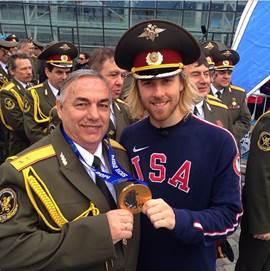 First gold medal winner Sage Kostenburg was "super stoked", I would assume, to pose with a Russian guard