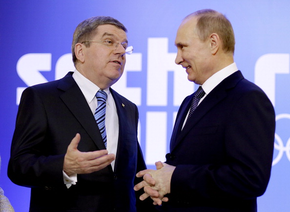 IOC President Thomas Bach greets Russian leader Vladimir Putin during tonight's IOC Session Opening Ceremony ©AFP/Getty Images