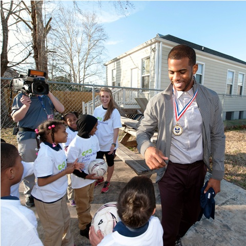 New Laureus Ambassador Chris Paul on a visit to the KIPP Central City Primary School in New Orleans ©Laureus 