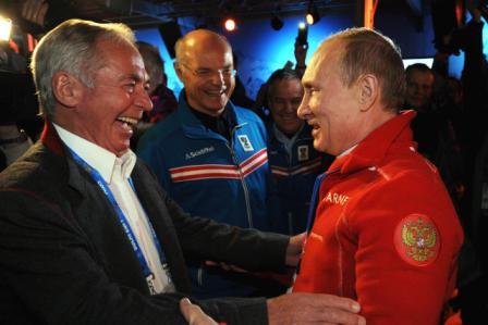 Russian President Vladimir Putin visits the Austria Tirol House last night and meets skiing legend Karl Schranz