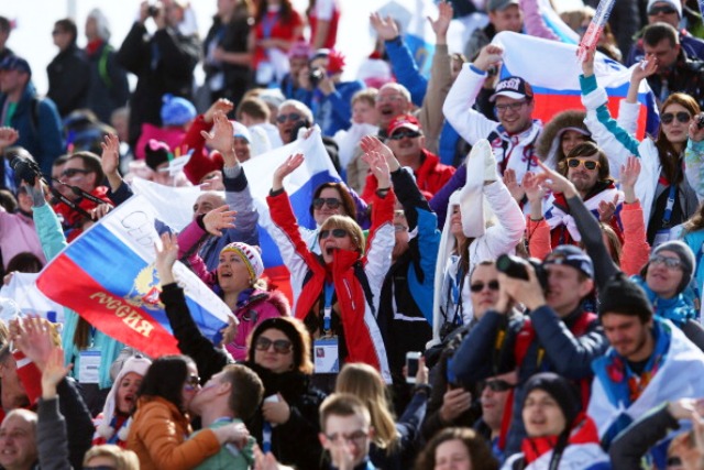 Russian fans celebrate one of 13 gold medals won by its athletes at Sochi 2014 ©Getty Images 
