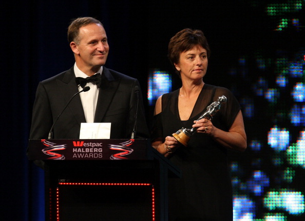 Susan Devoy, pictured here with New Zealand Prime Minister John Key, was the first athlete to top the women's squash world ranking ©Getty Images