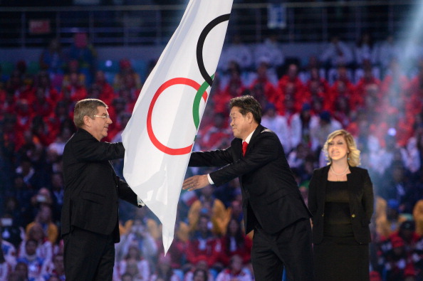 The Olympic flag is passed to Pyeongchang mayor Lee Seok-rae ©Getty Images