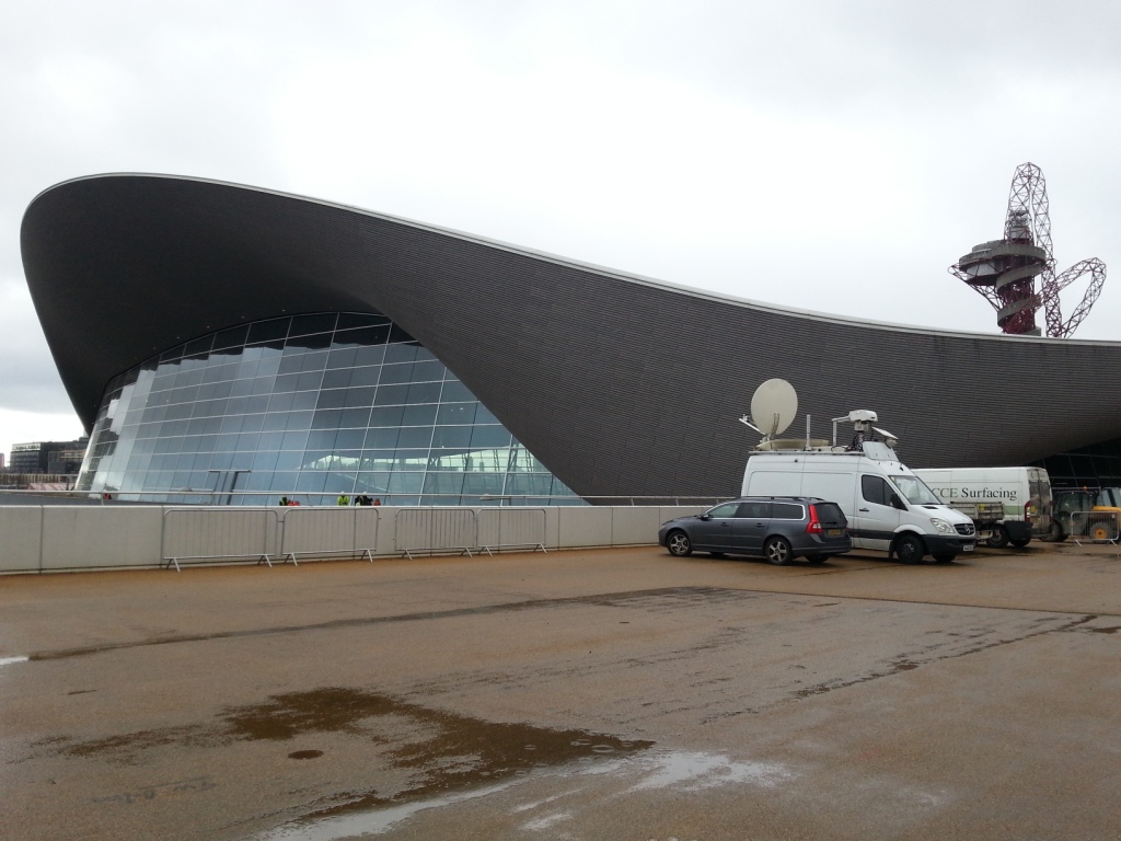 The temporary seating has been removed from the Aquatics Centre with 2,800 square metres of glass put in its place ©ITG