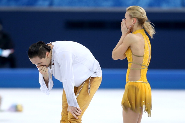The victorious Russian pair are overcome with emotion after their emphatic gold medal ©Getty Images