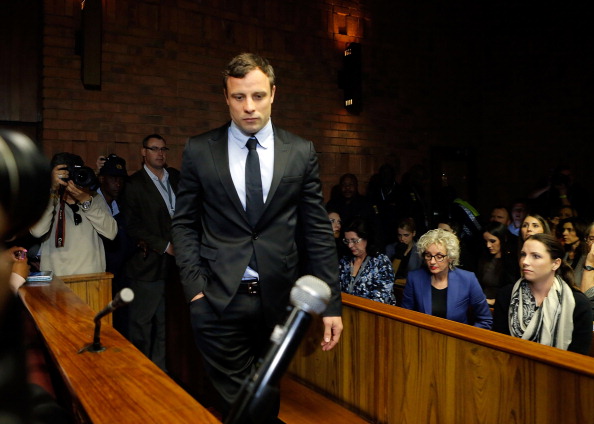 Oscar Pistorius, pictured here at an indictment hearing in August, has been under the glare of the media at each of his court appearances since the death of Reeva Steenkamp ©Getty Images