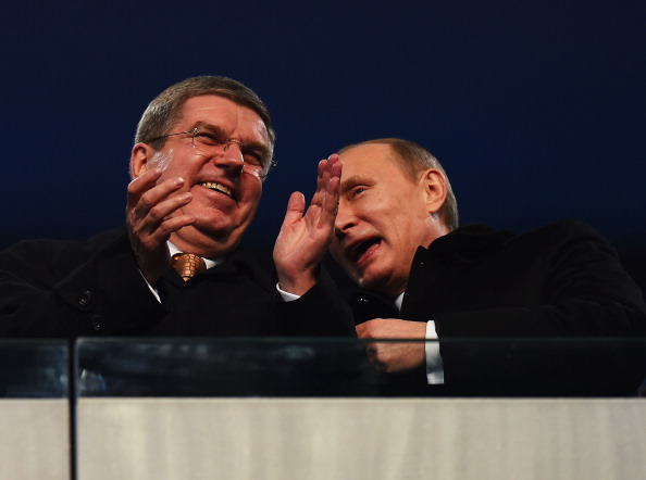 Sharing a joke perhaps? IOC President Thomas Bach and Russian President Vladimir Putin at the Opening Ceremony ©Getty Images
