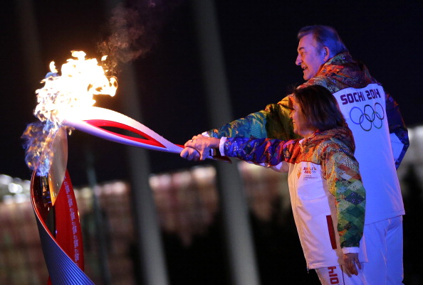  Irina Rodnina and Vladislav Tretyak light the Olympic Cauldron ©AFP/Getty Images