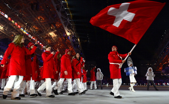 Simon Ammann carrying the Swiss flag in yesterdays Opening Ceremony ©Getty Images