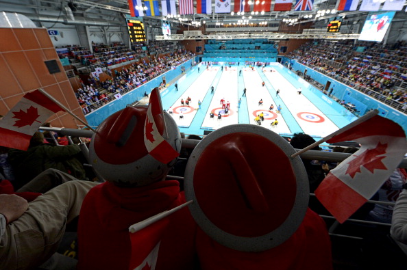 A Canadian contingent enjoy the curling action this afternoon in Sochi ©AFP/Getty Images