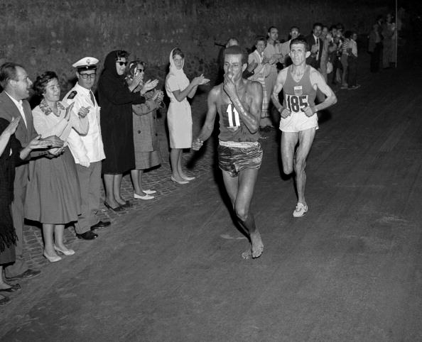 Abeba Bikila barefooting his way to marathon victory at Rome 1960 ©AFP/Getty Images