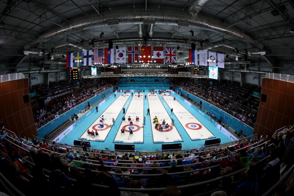 Action is underway at the Ice Cube Curling Centre ©AFP/Getty Images