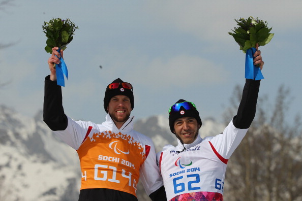 Brian McKeever and guide Erik Carleton celebrate their gold medal triumph ©Getty Images