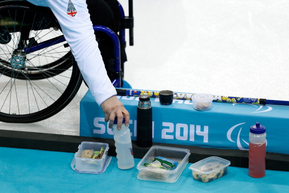 Britain stop for a snack midway through their curling victory over Slovakia ©Getty Images