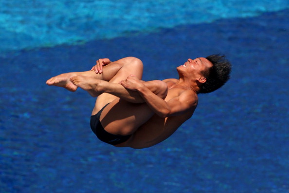 He Chong recovered from a disappointing third dive to claim victory in the men's 3m springboard ©Getty Images