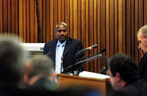 Chris Mangena gives a ballistics testimony at Oscar Pistorius' murder trial ©AFP/Getty Images