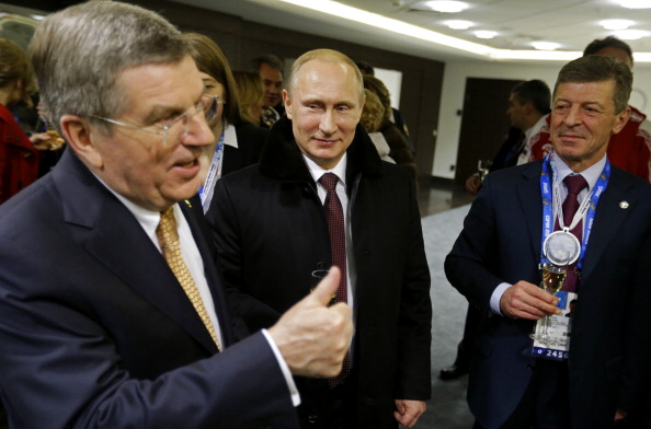 Dmitry Kozak (right), pictured here with Russian President Vladimir Putin and International Olympic Committee chief Thomas Bach, had been overseen preparations for Sochi 2014 since 2008 ©Getty Images