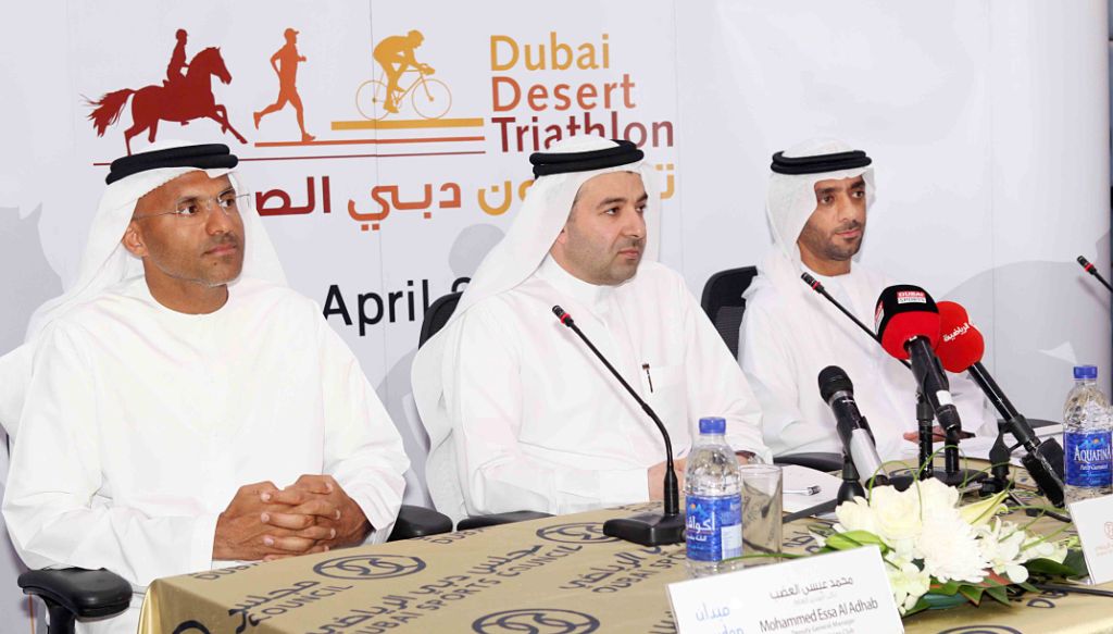 Dubai Equestrian Club deputy general manager Mohammed Essa Al Adhab, and Dubai Sports Council's Nasser Al Rahmah and Adil Yousif Al Bannay launch the first ever Dubai Desert Triathlon ©Dubai Sports Council